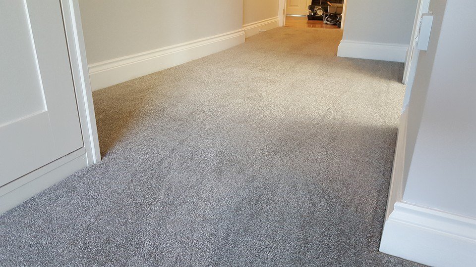 carpet layed in irregular shaped hallway